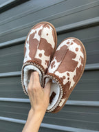 Cow print bruin slippers