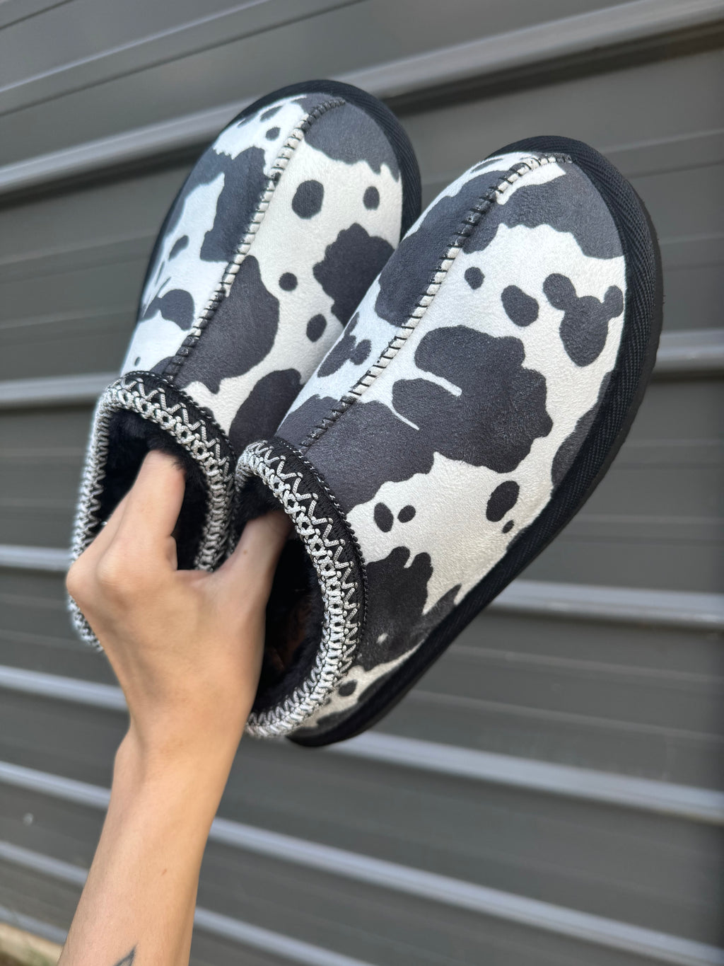 Cow print bruin slippers