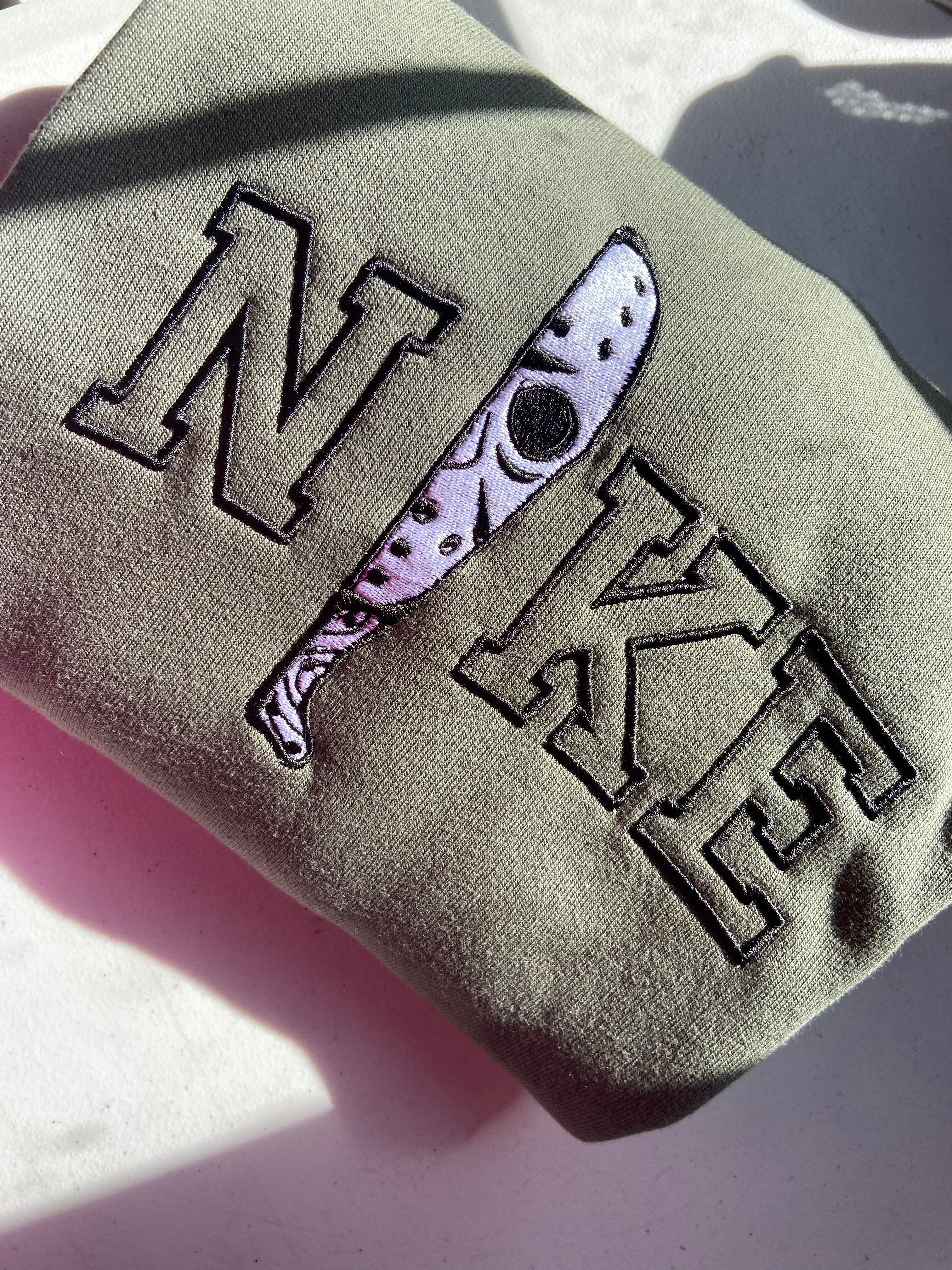 Jason Embroidered NKE sweatshirt