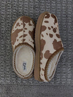 Cow print bruin slippers
